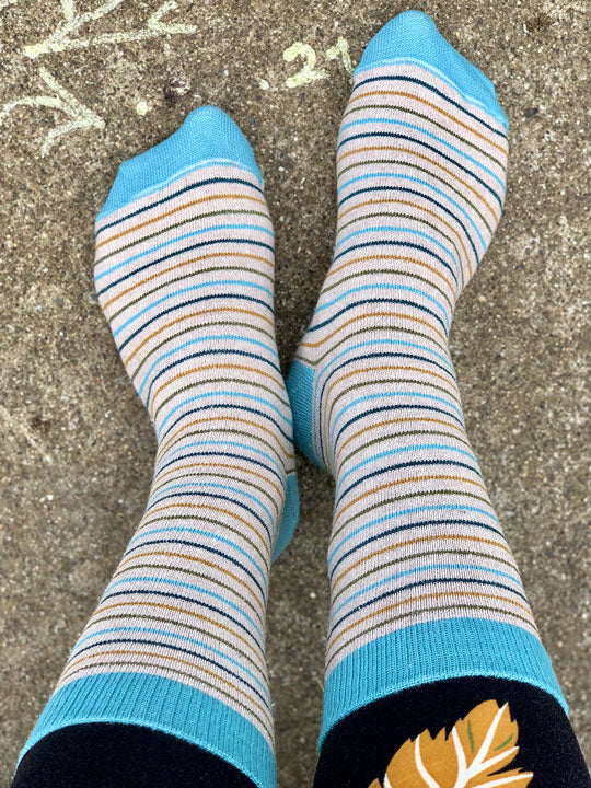 Aqua, Teal, Olive, Gold Striped Socks on Linen background
