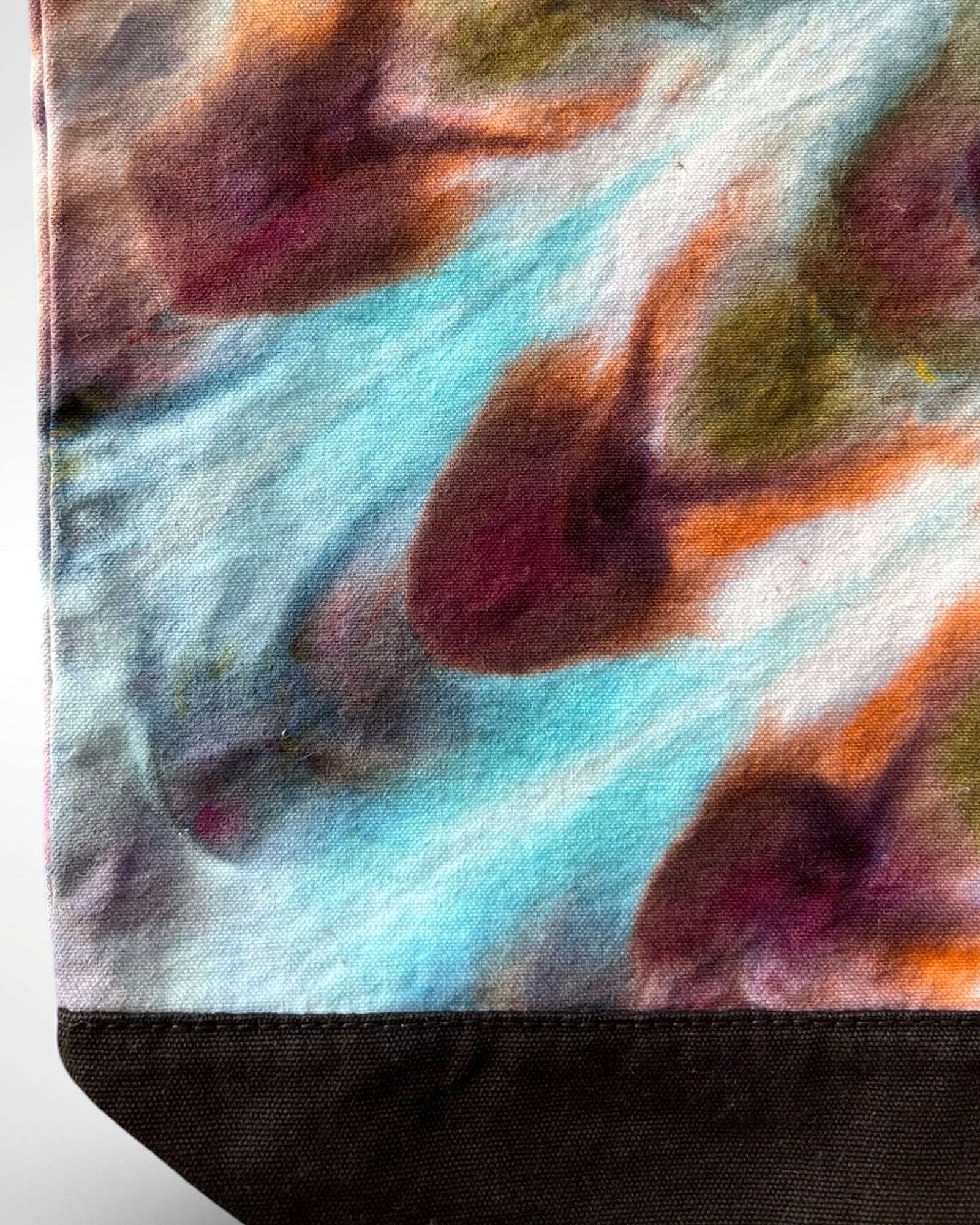 ice dye canvas tote tag peacock close up
