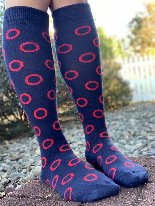 Red circles on blue knee high socks